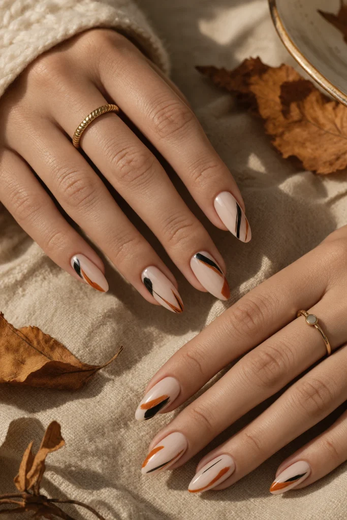 Black and orange abstract Halloween nail swipes