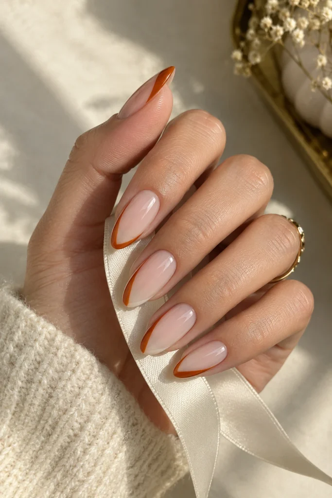 Orange side French Halloween nails