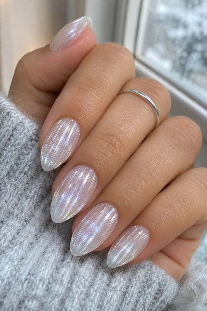 Icy white ribbed glass nails with a frosted crystal effect.
