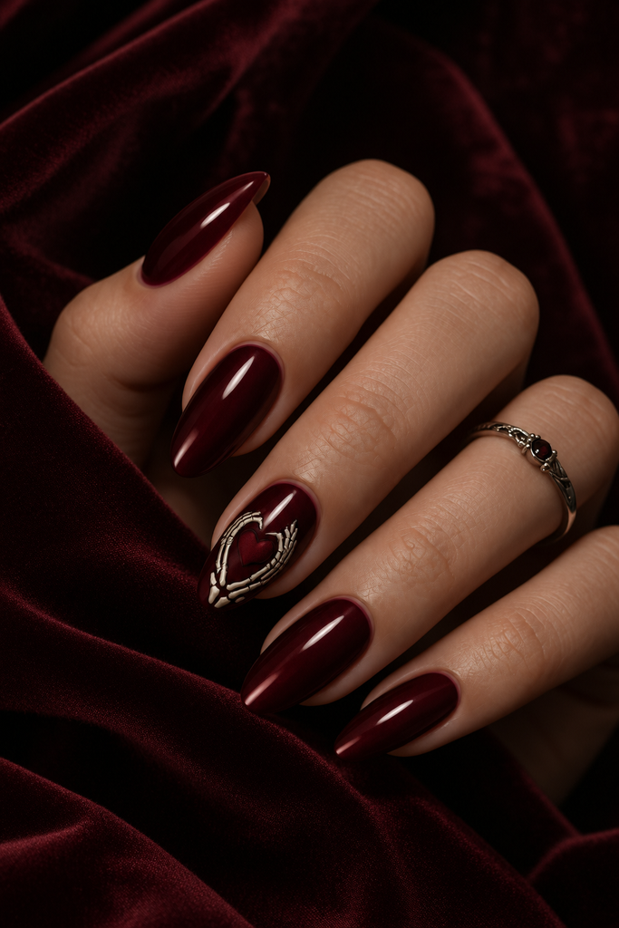 Oxblood Nails With a Skeleton Heart Accent